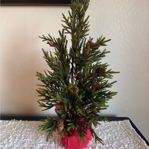 Festive Green Sparkling Pine Tree with Red Burlap Base 23”